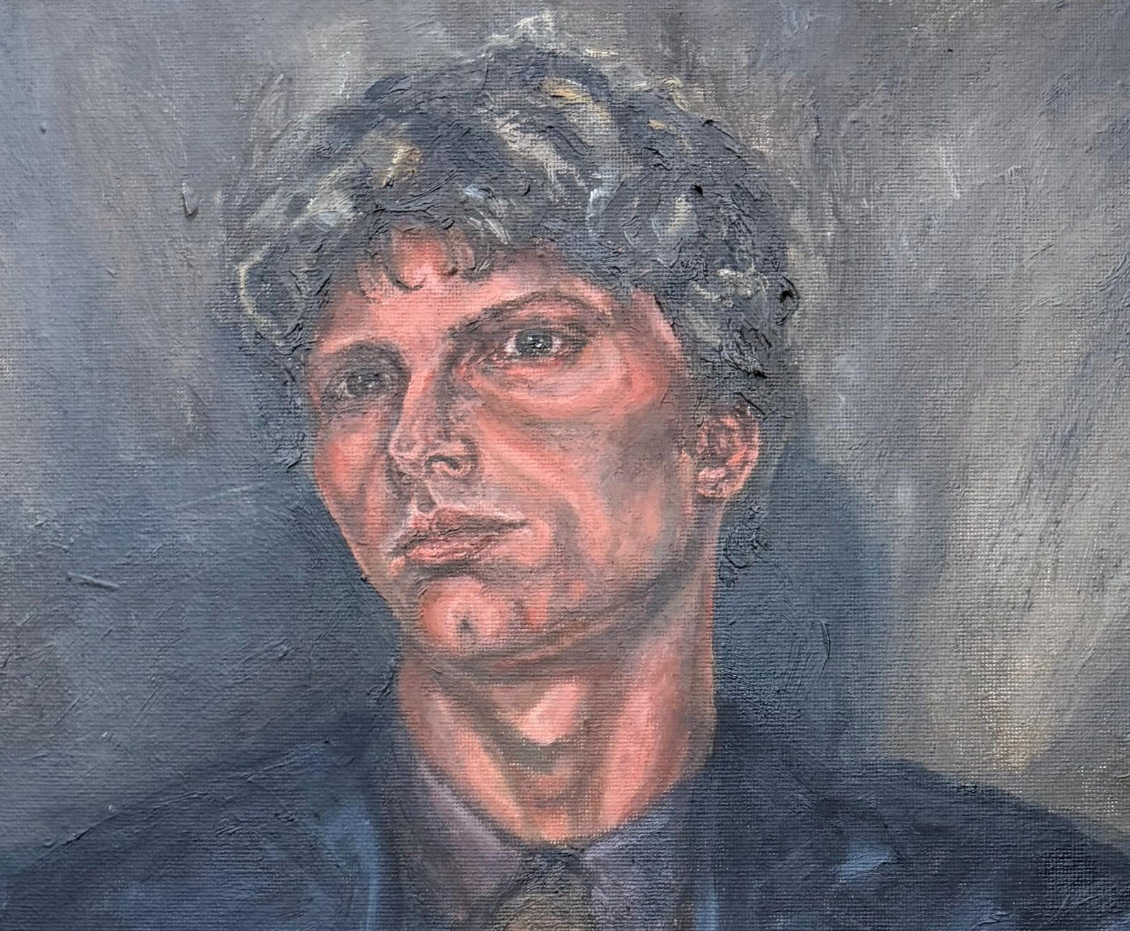 Gravitas Portrait of young man in a dark suit